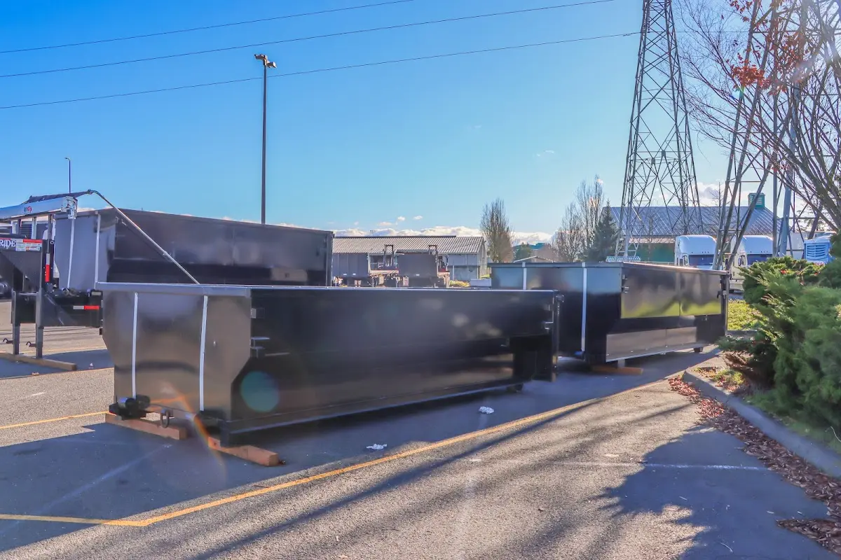 Roll-off dumpster ready for waste disposal at job site for Roll Off Dumpster Rental in Hutto